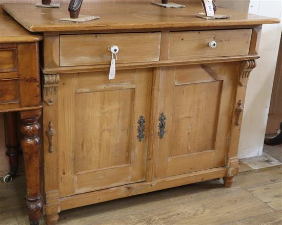 A 19th century European pine low cupboard W.98cm